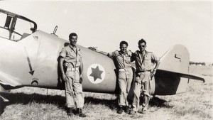 From left, Lou Lenart, Gideon Lichtman, and Modi Alon, stand in front of one of the Avia S199s.  Photo Credit: from the movie "Above and Beyond."