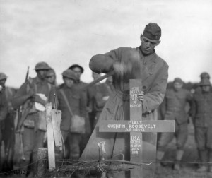 2nd Lieut. William P.T. Preston of the 42nd Division erects an improved wooden cross over the grave of Quentin Roosevelt.  Credit:  NARA 111-SC-18913