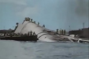 Rare color image of capsized wreck of one of the US Navy ships at Pearl Harbor immediately after the attack.