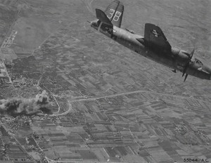 A B-26 Marauder, 438th Bomb Squadron, 319th Medium Bomb Group, striking what is probably the Grizzana Bridge, Italy, August 22, 1944.  Photo Credit:  USAAF